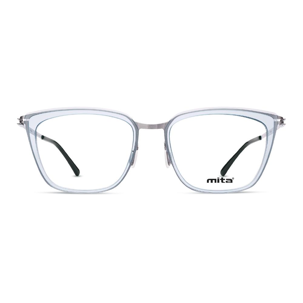 Damenbrille MITA MT1026 mit transparentem Rahmen und schwarzem Bügeln, frontale Ansicht.